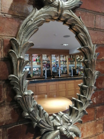 Stables bar reflecting in a mirror